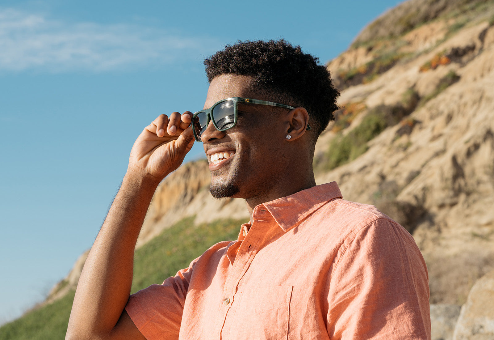 Man wearing Knockaround Sunglasses