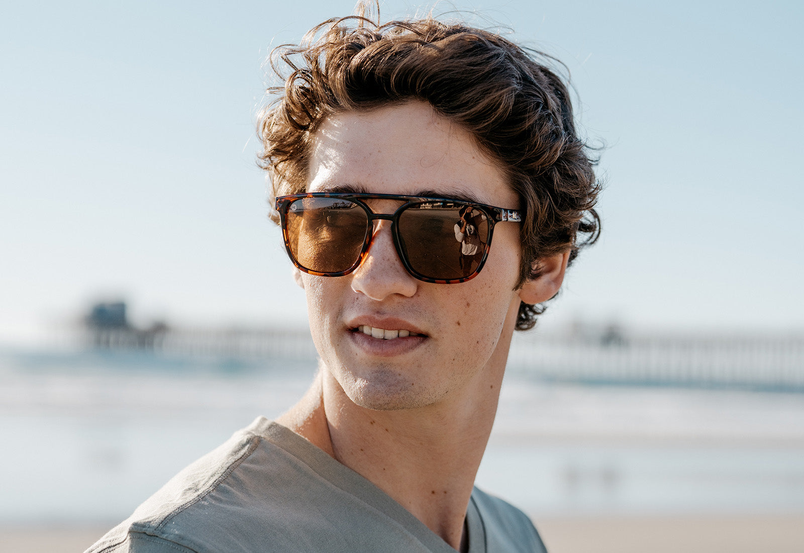 Sunglasses with Glossy Tortoise Shell Frames and Polarized Amber Lenses, Model